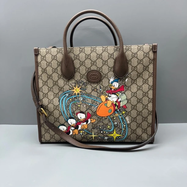 95新 GUCCI/古驰 老花唐老鸭联名托特包 尺寸31*26 SV16717