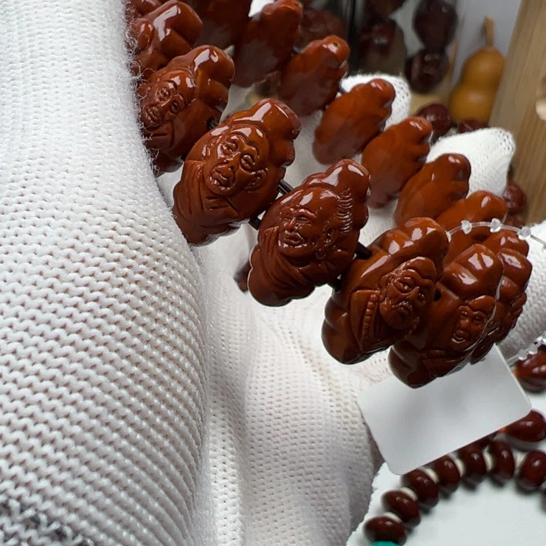 橄榄核吊坠啊***镭橄榄核