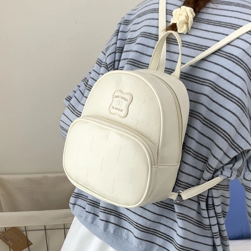 奶呼呼超火韩国ins少女简约饼干双肩包