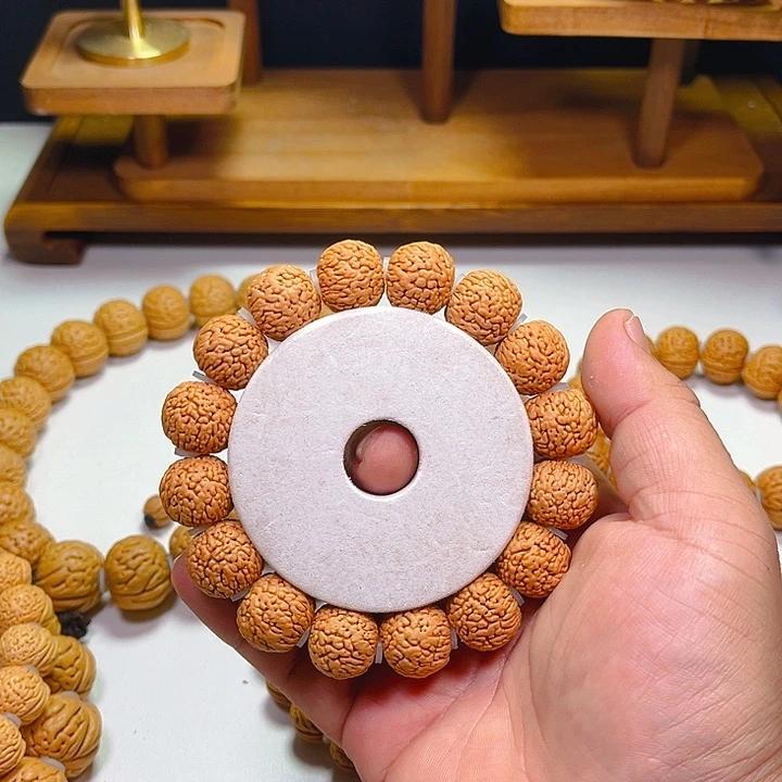 L***、桃核吊坠桃核野凤