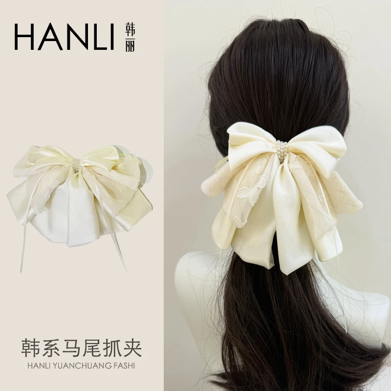 HANLI米杏色提花重工蝴蝶结马尾抓夹2025新款原创设计感发饰潮