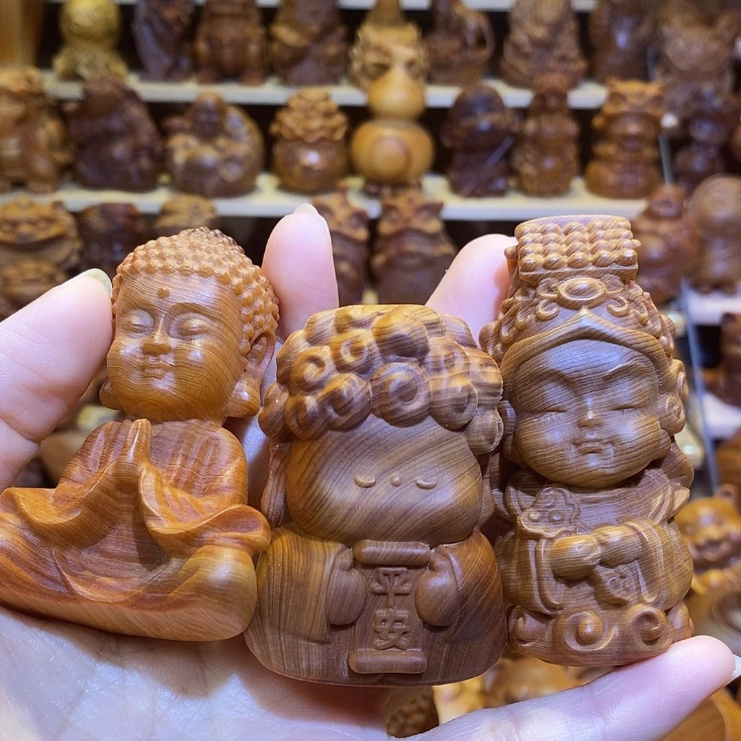 丁****木崖柏木雕手把件