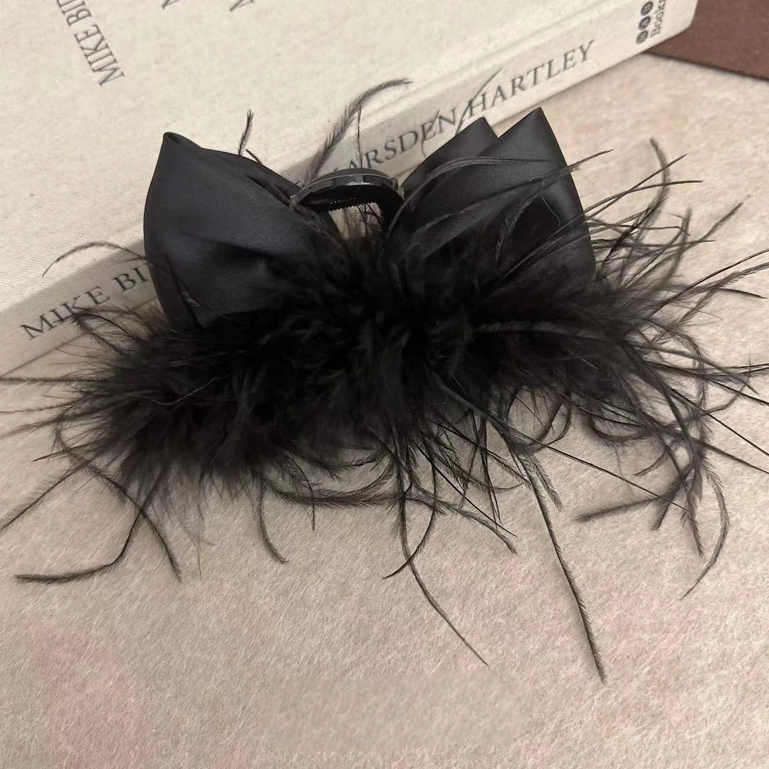 超仙羽毛抓夹大号蝴蝶结发夹在逃公主高级感后脑勺鲨鱼夹盘发夹子