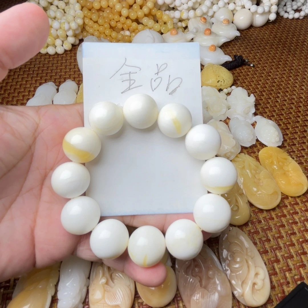 非金属贝壳卡18带黄全品手串