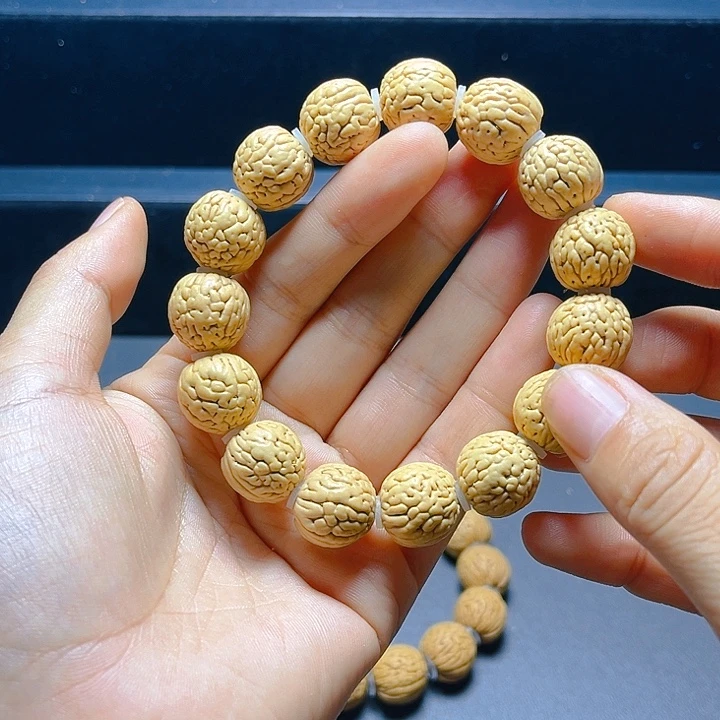 伊***轩吊坠桃核桃核手串