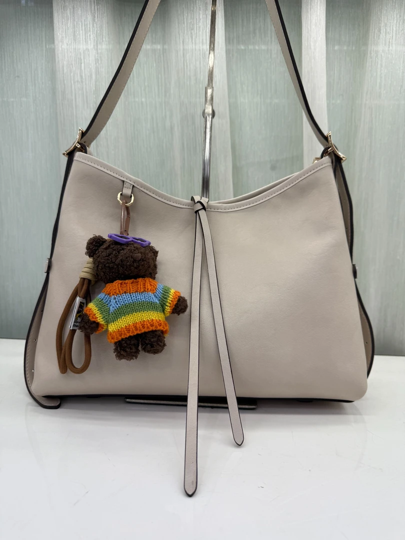 九州袋鼠2025年爆款流浪包腋下单肩斜跨轻奢风