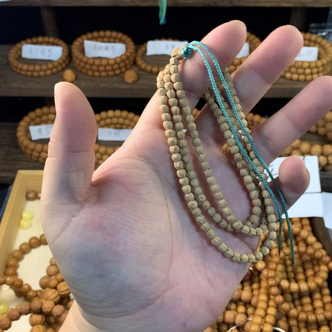 厄***.猴头核桃手串金豆百香籽