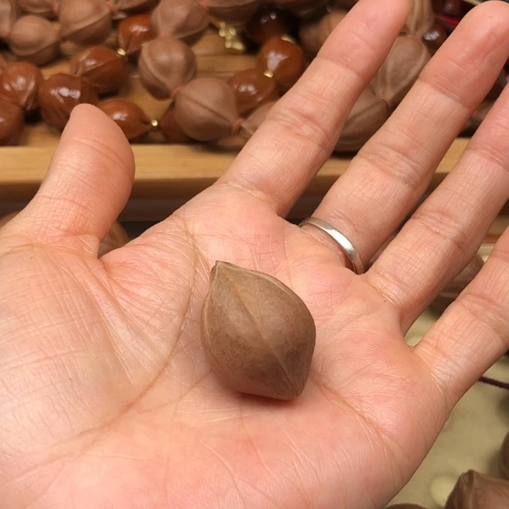 川***手串橄榄核梅林铁核20 X28三通