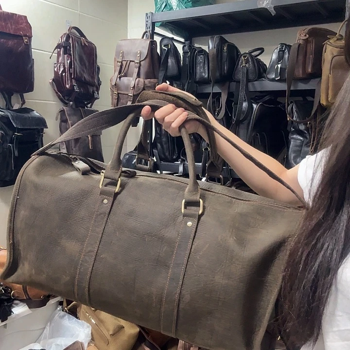 头层牛皮旅行包包