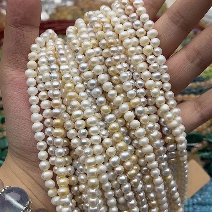 玛瑙/玉髓未镶嵌珠宝半成品一条5.5mm左右椭圆珍珠有生长纹