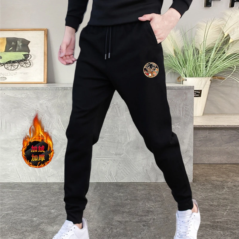 啄木鸟男士秋季运动宽松休闲裤潮流男裤子百搭时尚秋冬弹力男卫裤