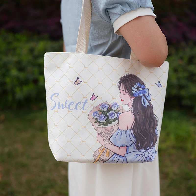 2025新款印花帆布单肩包通勤百搭时尚妈咪包休闲学生补习包大容量