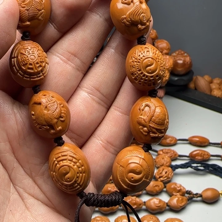 淬****橄榄核手串/手链好