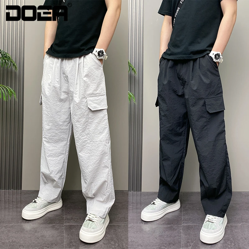 2025年夏季薄款潮流韩版纯色宽松哈伦大口袋工装休闲原创长裤男士