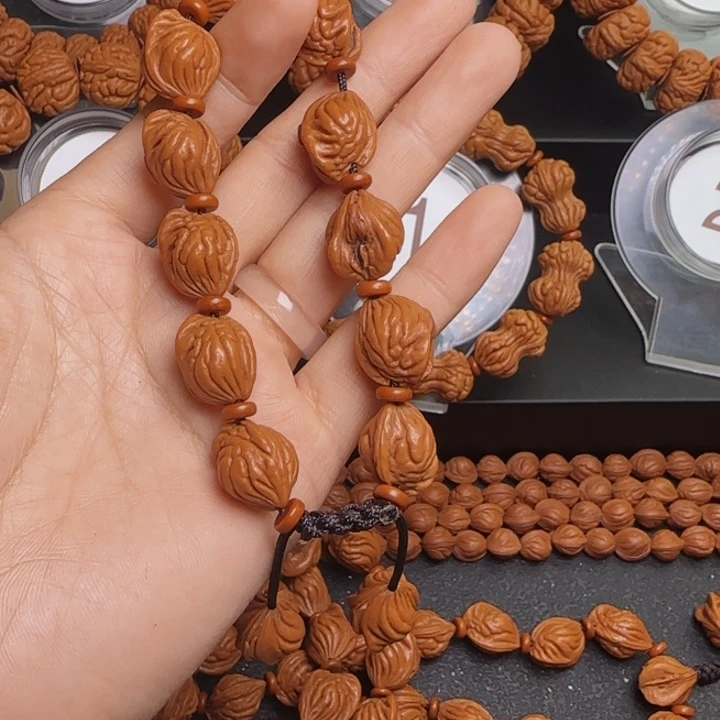 慕***藏桃核手串龙纹桃核