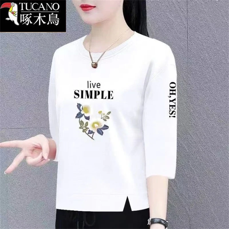 啄木鸟夏季七分袖纯棉女T恤2025年新款休闲小众印花圆领大码上衣