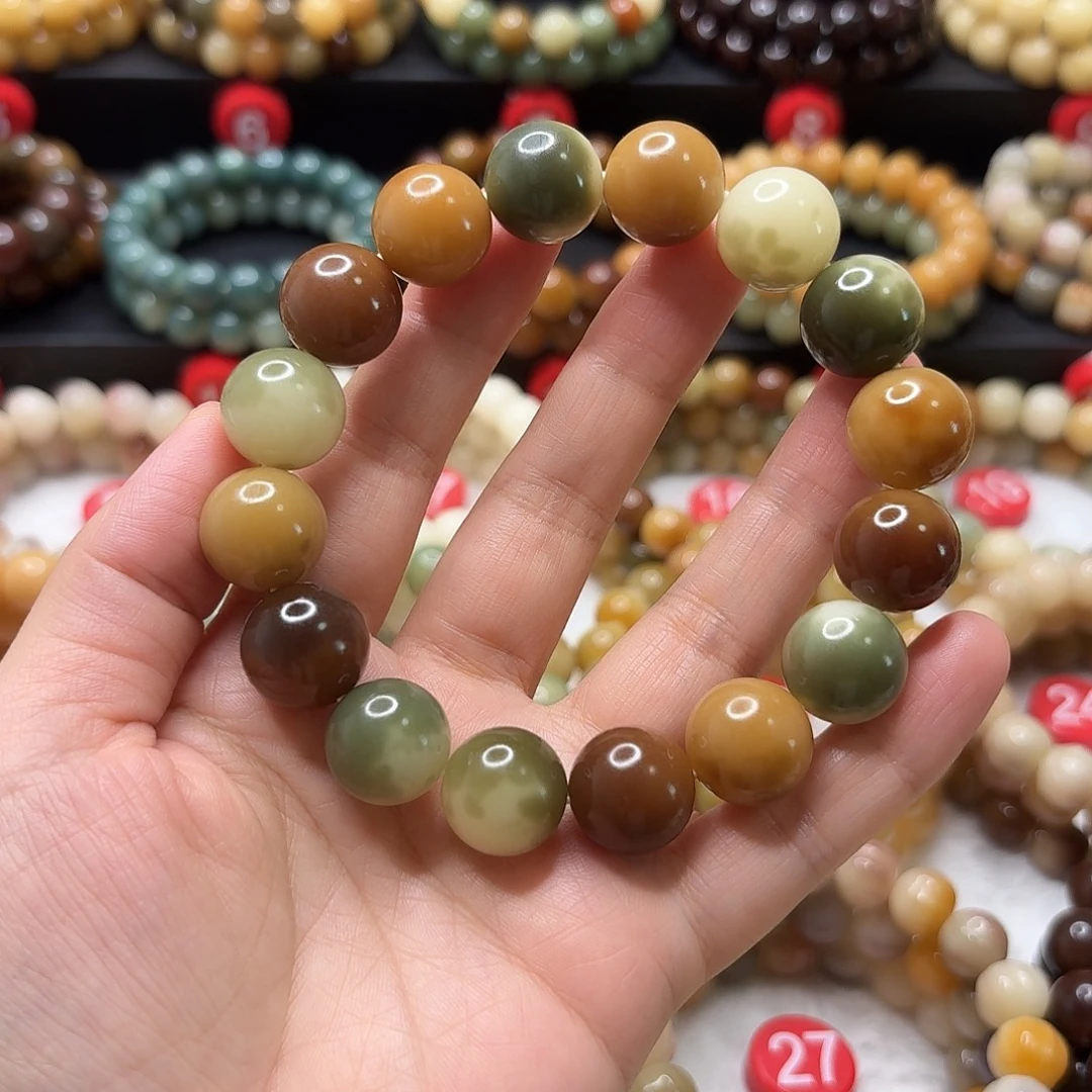 菩提根/象牙果手串飘花正圆 已加备用珠