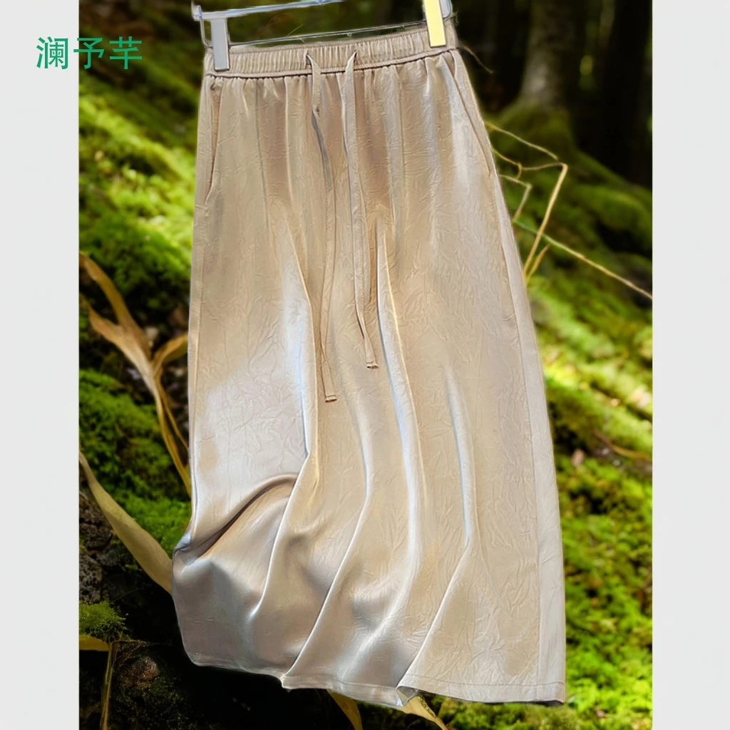 夏季2025新款醋酸缎面高腰垂感薄款印花开叉a字女半身裙凸显