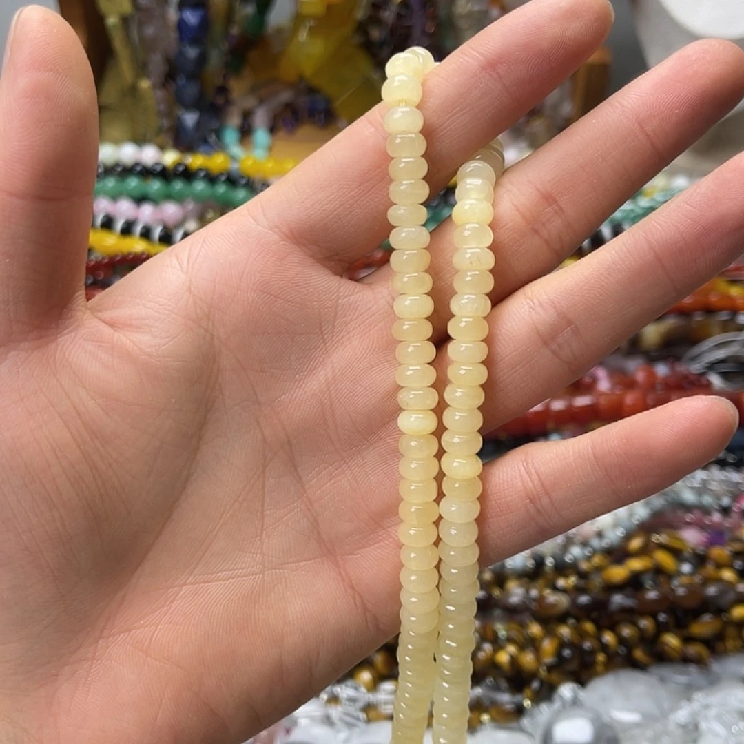 玛瑙/玉髓未镶嵌珠宝半成品卡7.5米黄玉算盘珠一条