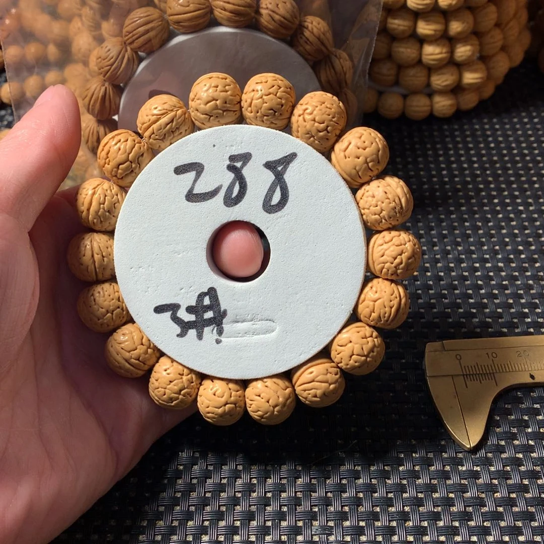 小***艺手串桃核3号链接，