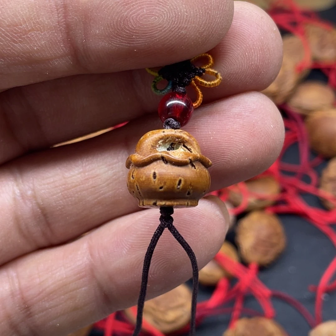 桃核雕刻花蓝单粒