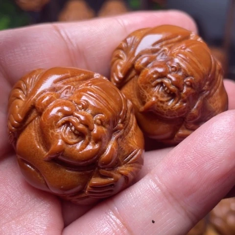 橄榄核把件横财手球一对3.3左右