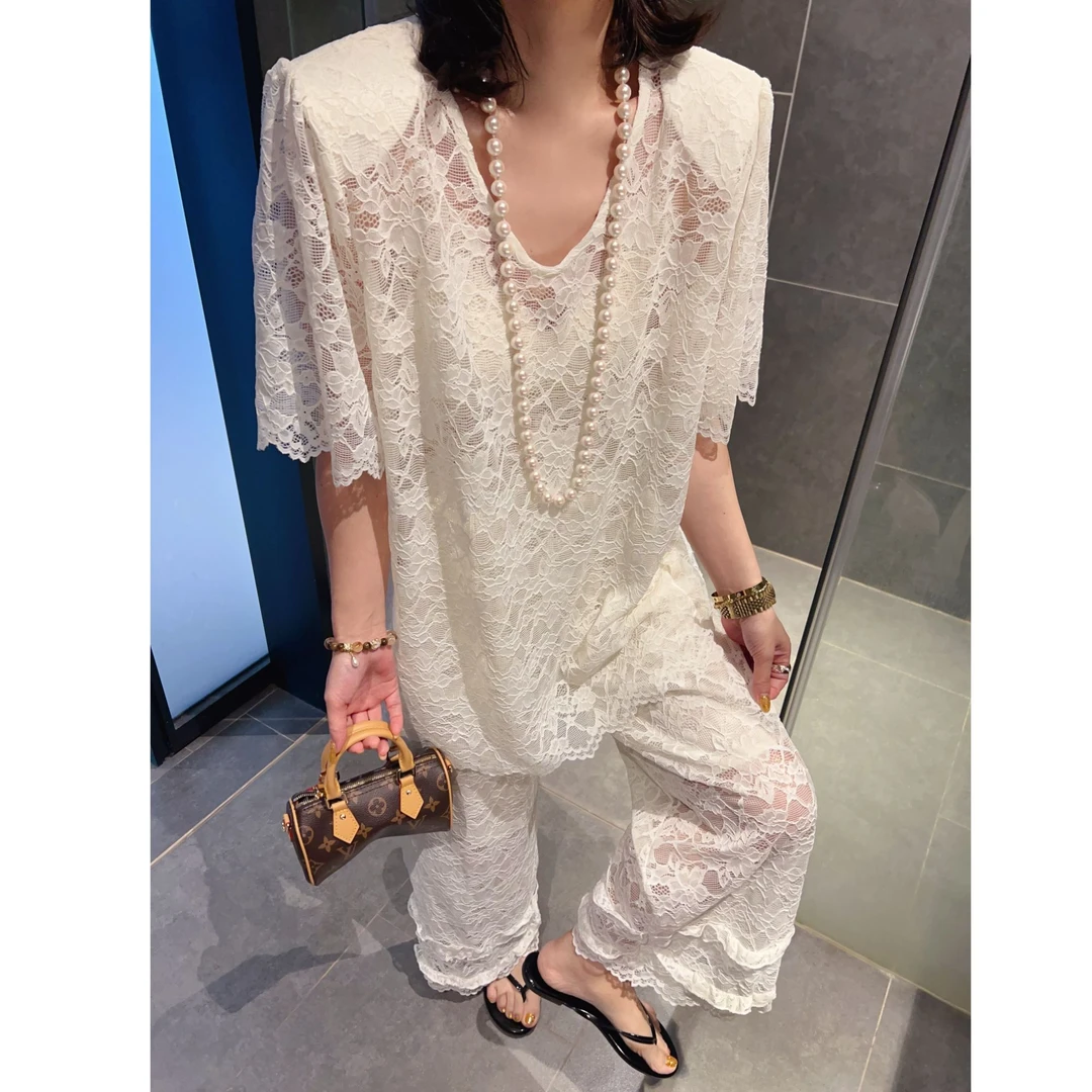 松弛感勾花镂空蕾丝套装女夏季爆款韩系垫肩短袖上衣阔腿裤两件套