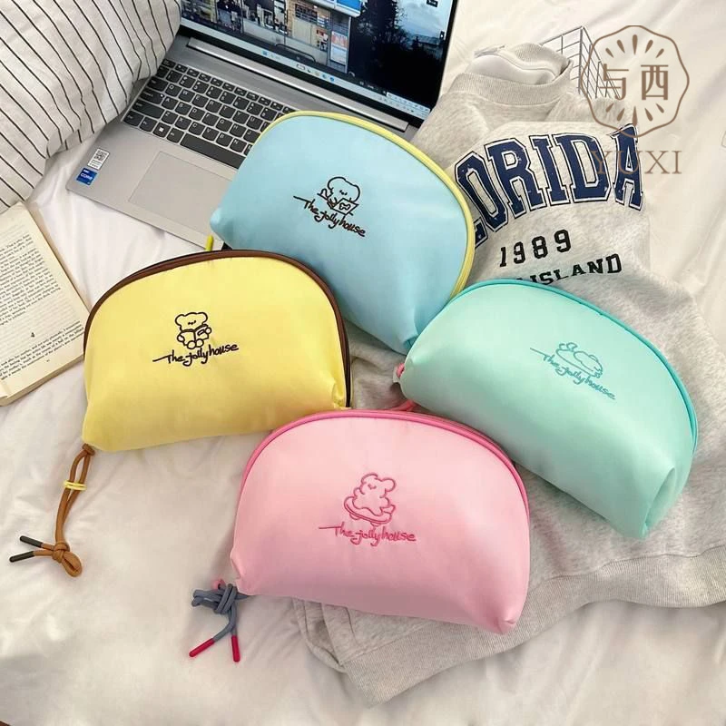 YUXI/与西时尚卡通线条小狗收纳包2025新款便携式化妆品收纳包