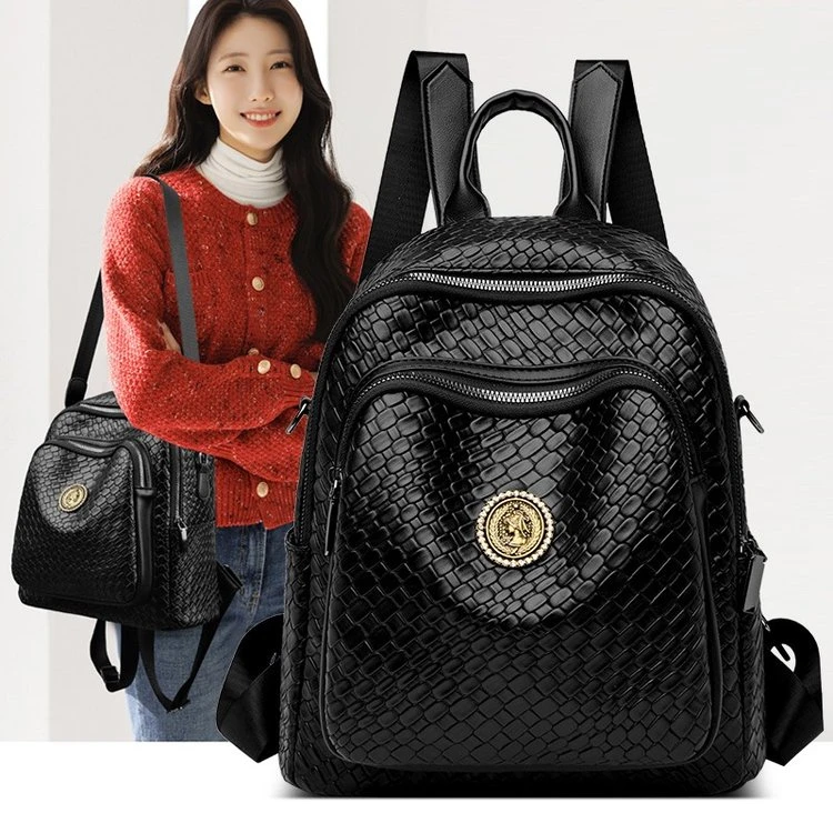 新款休闲简约潮流大气质感双肩包堡萝009