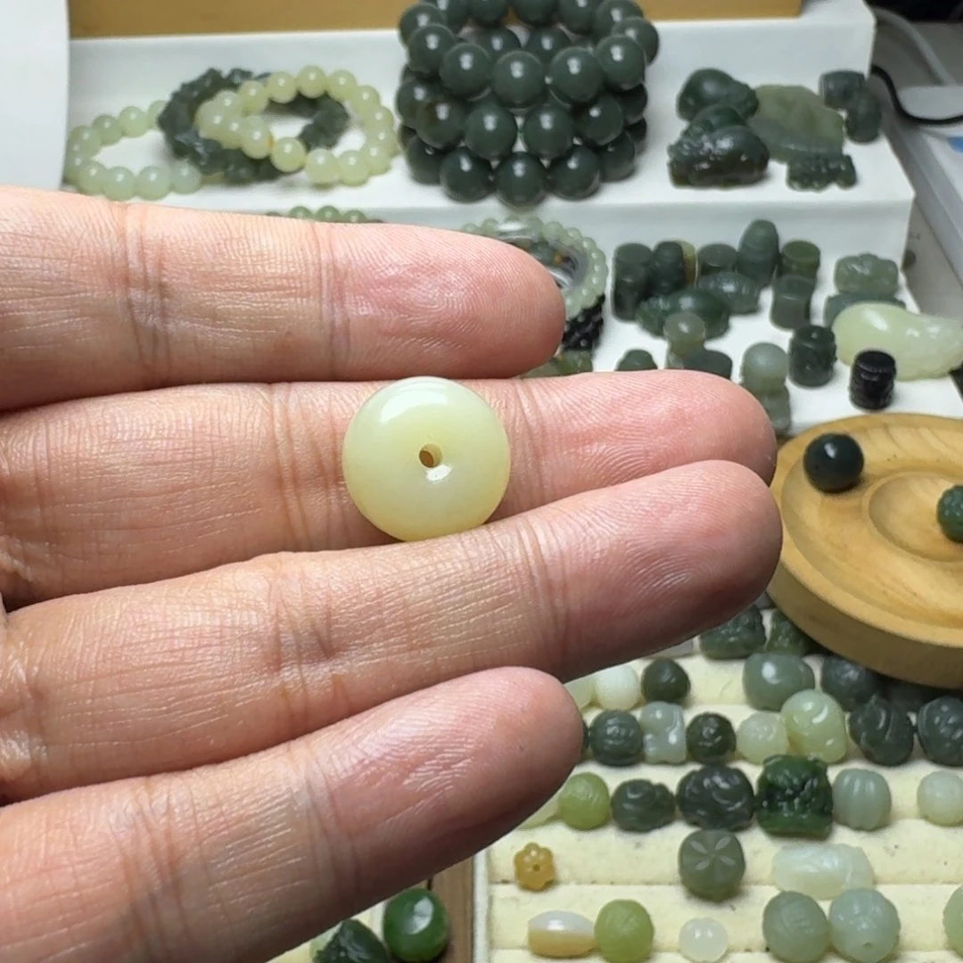 璋***和田玉未镶嵌珠宝半成品和田玉黄口算盘珠9×15+
