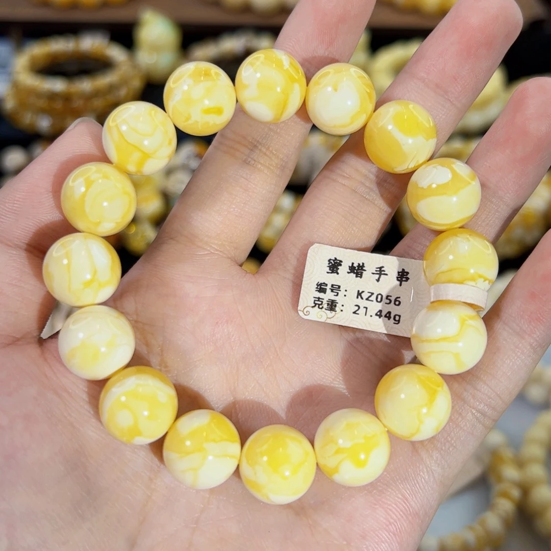 未镶嵌琥珀裸石13mm同料橘白花满蜡圆珠手串