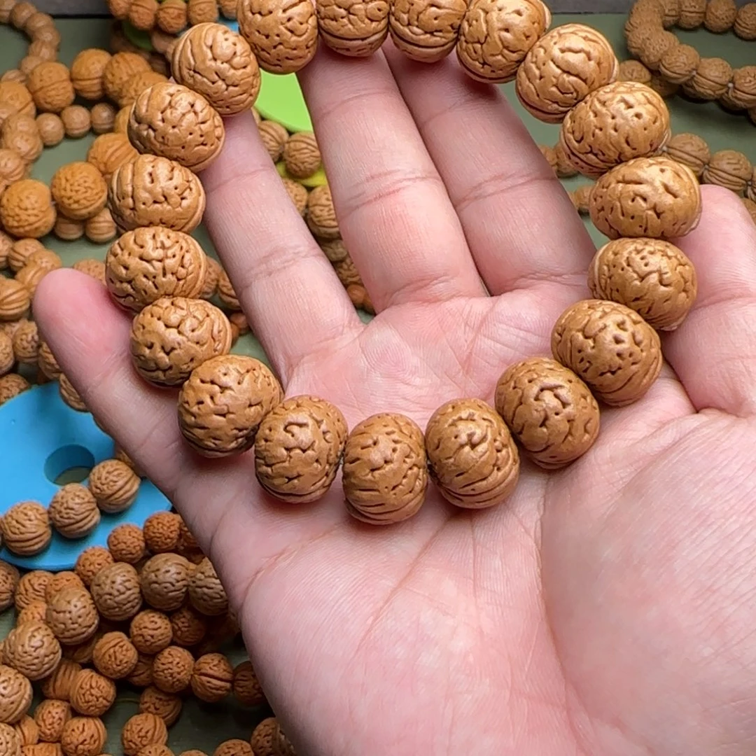 雲***螭桃核手串树王纽扣桃核手串