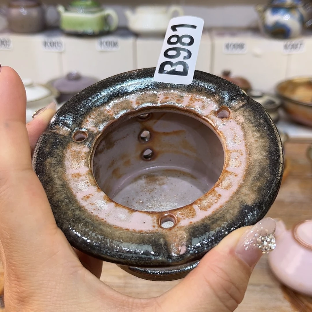 白泥茶杯庄**?陶瓷艺术