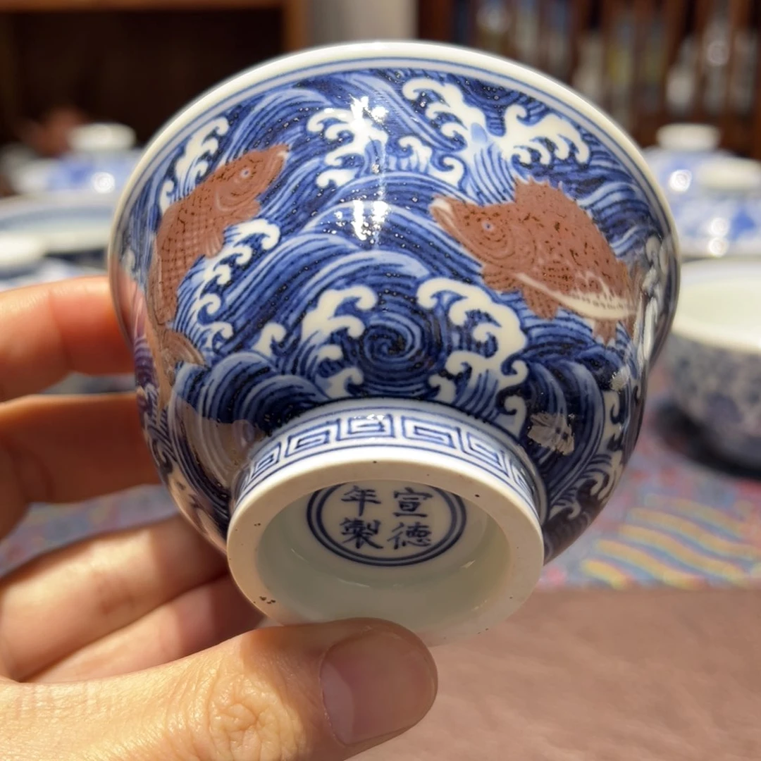 杯C****n青花釉里红海水鱼压手杯口径9.5厘米