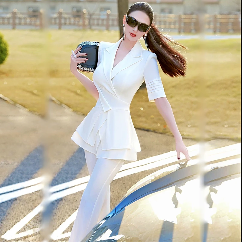 夏日时尚不规则设计感上衣喇叭裤两件套2025新款小众短袖薄款套装