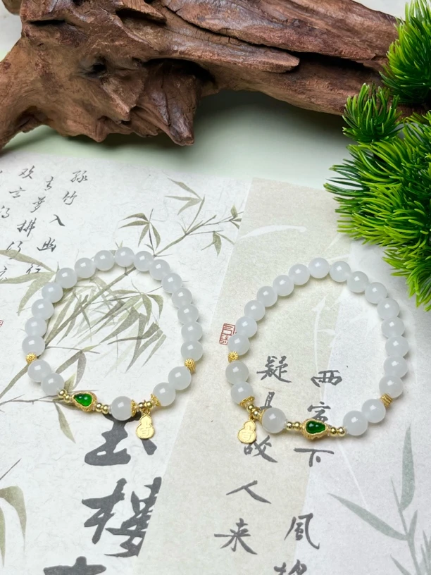 西亚珠宝BY57-和田玉白玉手串7mm+多样性发其一