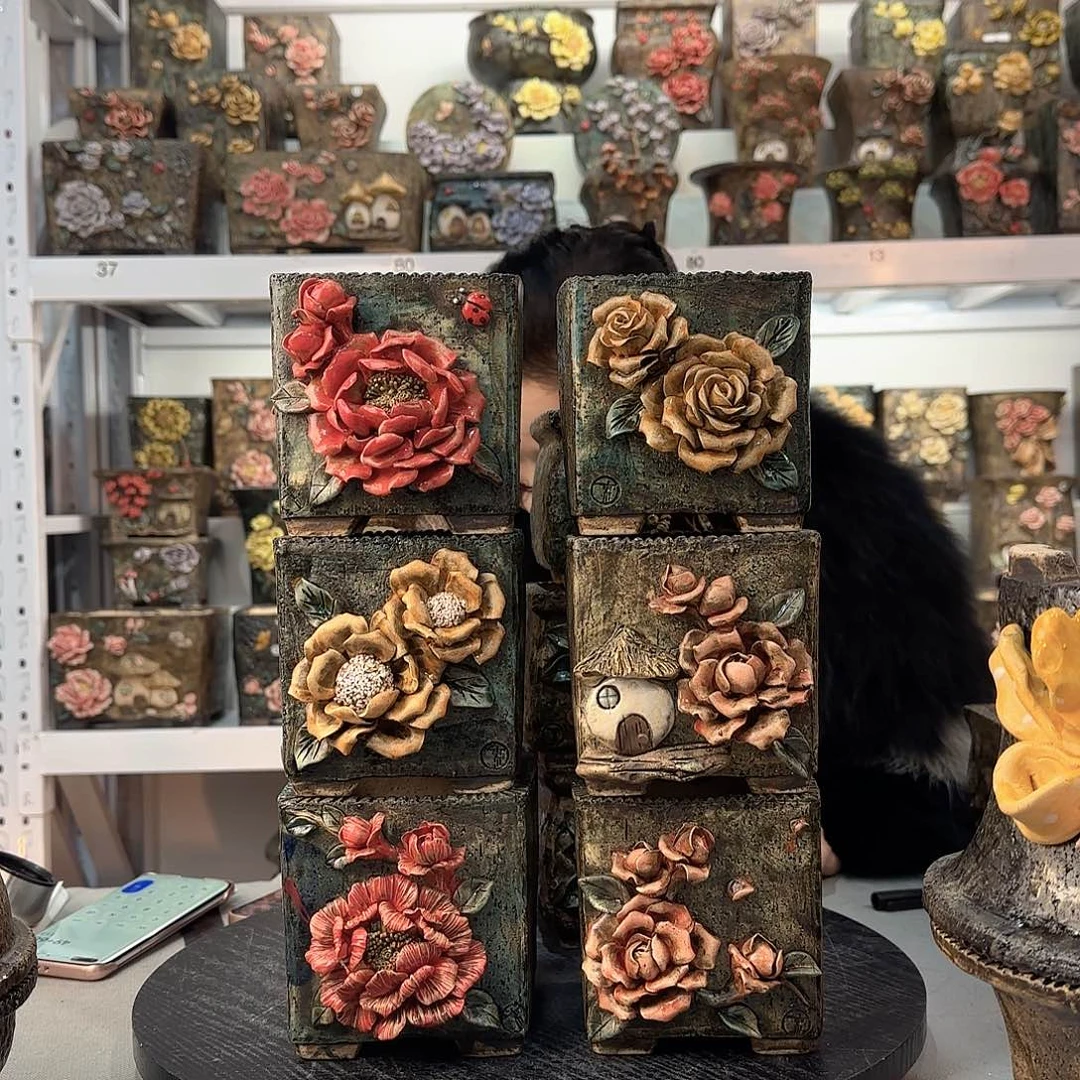 红陶弓**人青默花器麦饭石花器