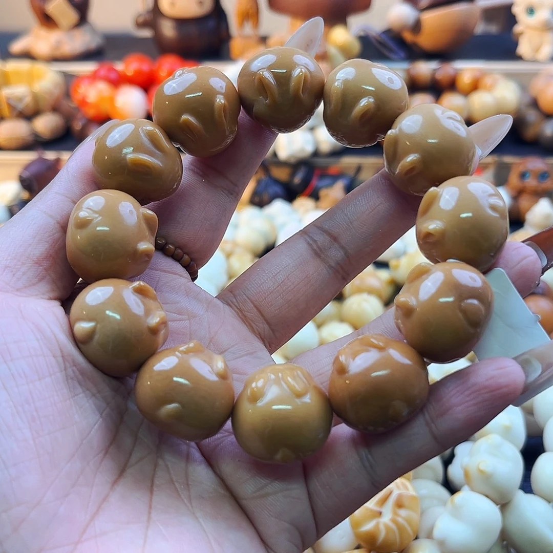 手串菩提根/象牙果玉兔微瑕