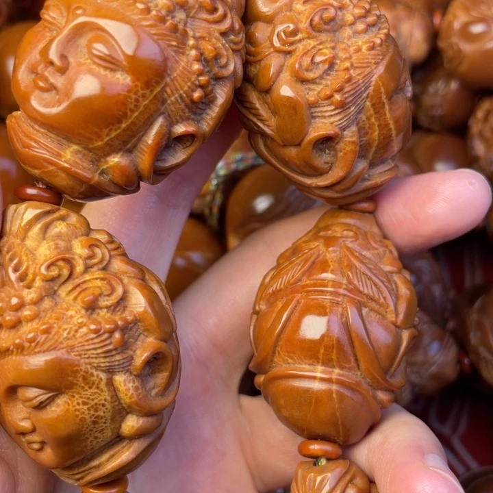 如***娇文玩核桃吊坠橄榄核