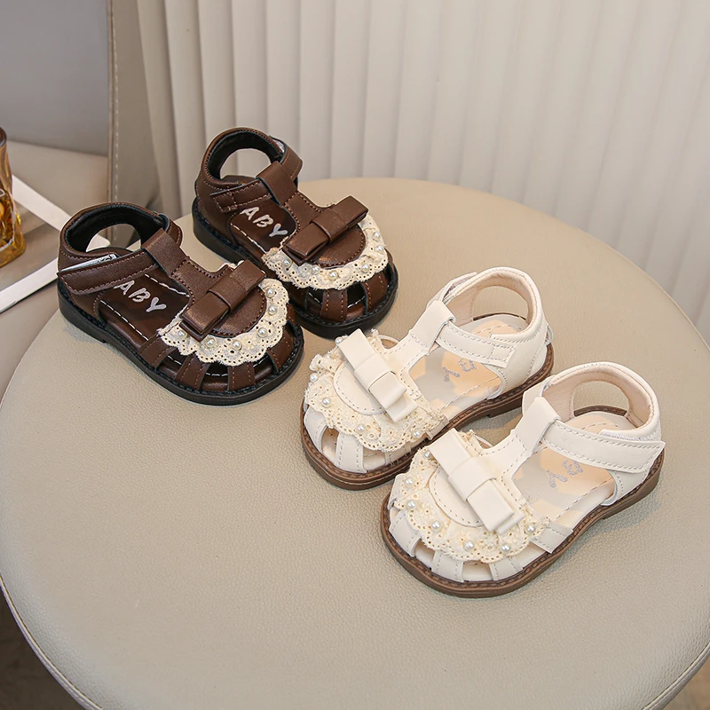 女童甜美蝴蝶结凉鞋女宝宝镂空学步沙滩鞋7288