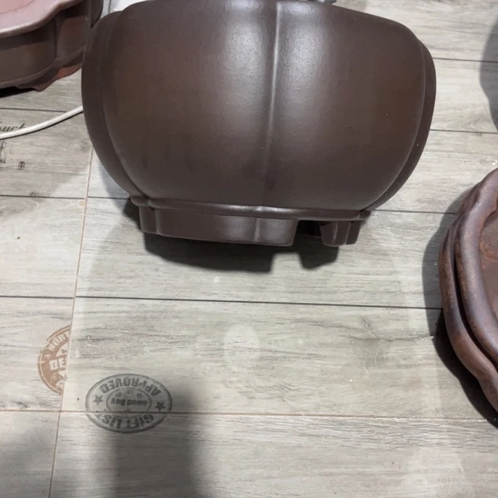 咪***店紫砂花盆宜兴紫砂工艺厂。