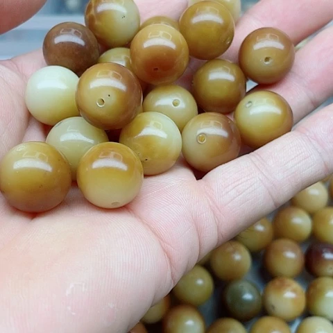 吊坠白玉菩提16瑕疵焦糖圆20颗