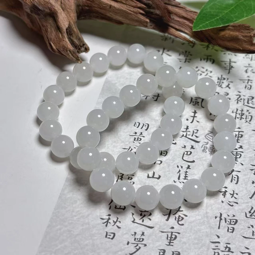 《铁头老猪》天然和田玉白玉圆珠手串约10mm多样性发其一
