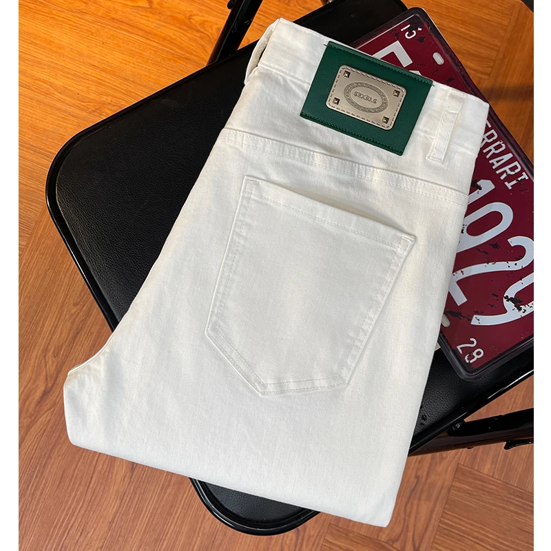高端白色牛仔裤男士时尚休闲九分裤春夏款欧洲站潮流修身小脚长裤