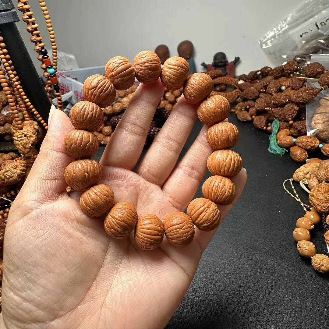 文玩猴头核雕手串红土豪图手串