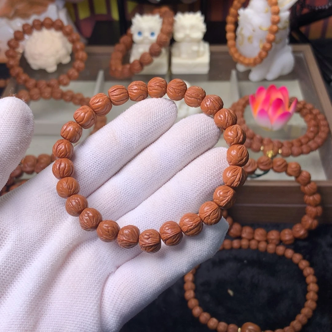 释***山桃核吊坠玉龙脊手串09