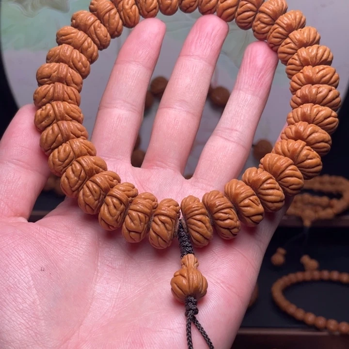 ζ***念桃核手串19祥云手持