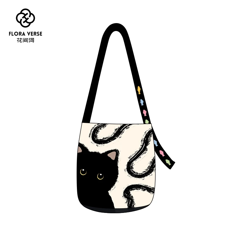 原创小黑猫飘带水桶包2025新款多用单肩斜挎女手提小众通勤帆布包