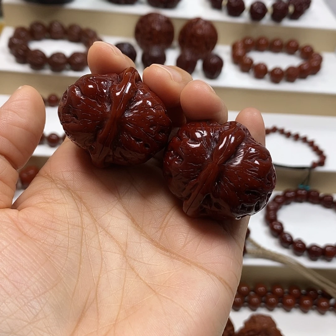 用***户橄榄核吊坠元宝核桃