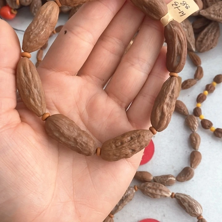 柏****远文玩异形秋子手串